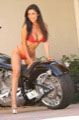 Hot motorcycle babe in tiny red bikini and killer body