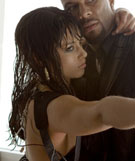 Alicia Keys and Common in "Smokin' Aces"