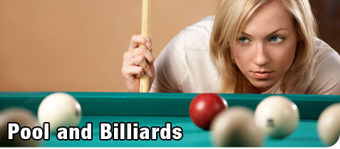 Young, Attractive, Blonde Woman Lining up her Shot During a Game of Billiards