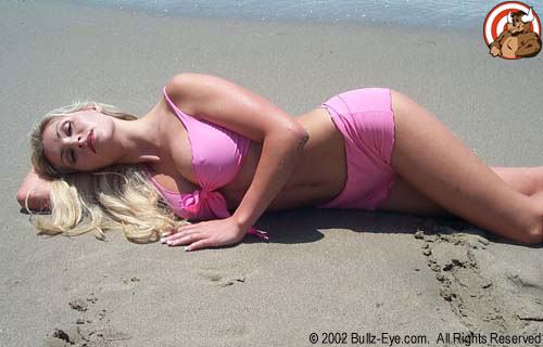 Karin in pink bikini on the beach in malibu