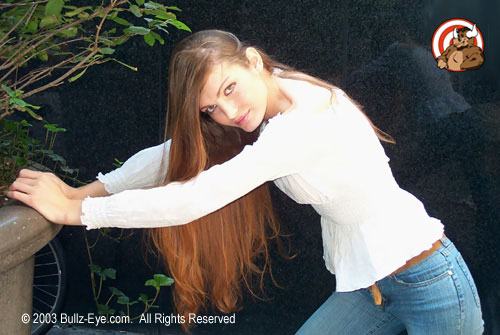 Nataliya in white shirt and jeans in natural light
