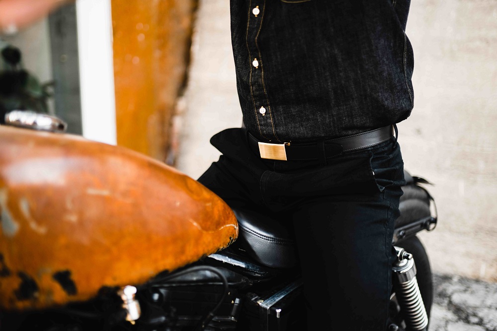 man on motorcycle wearing Mission Belt leather belt