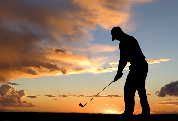 golfer at sunset