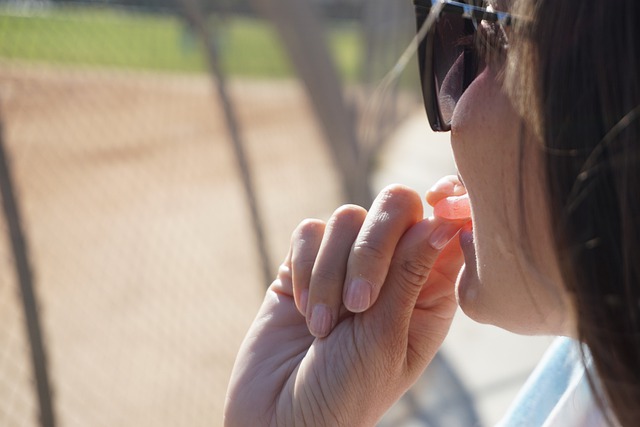 woman eating gummies