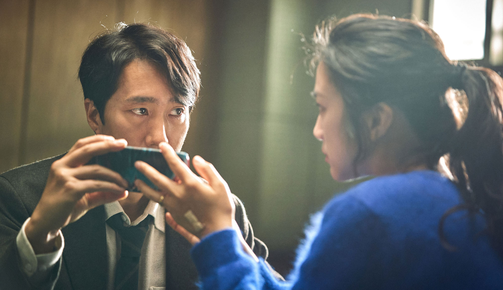 Park Hae-il and Tang Wei in "Decision to Leave"