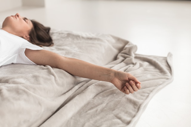 woman sleeping on bed