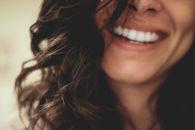 close-up of beautiful woman's smile with white teeth