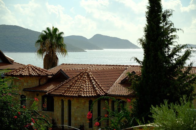 villa near water with old school roof tiles