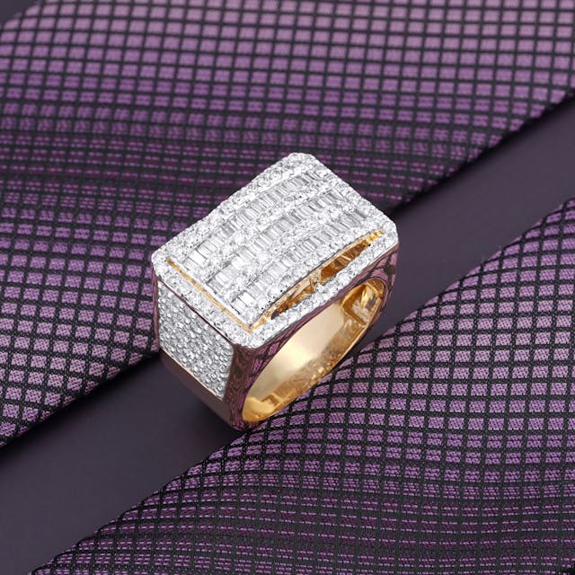 closeup of pinky ring for men with small diamonds