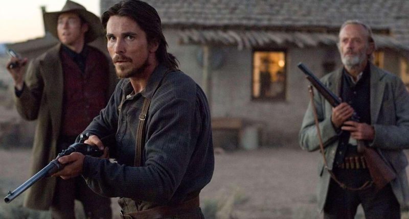 310 to Yuma Christian Bale holding gun