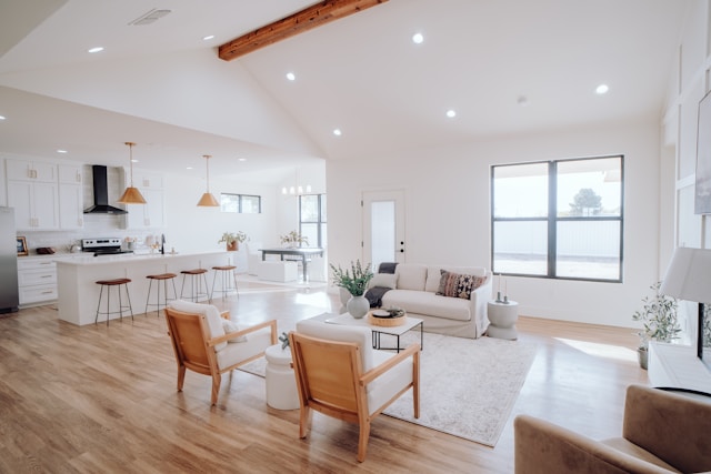 living room with white walls and white furniture