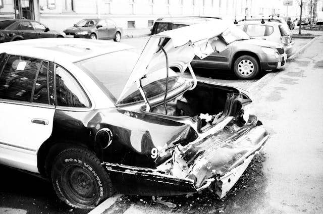 crashed car black and white photo