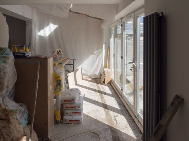 home renovation project in room with sliding doors