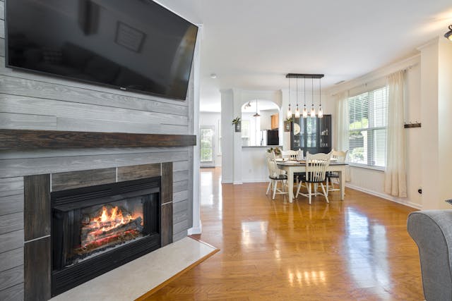 home interior with wood floor and fireplace