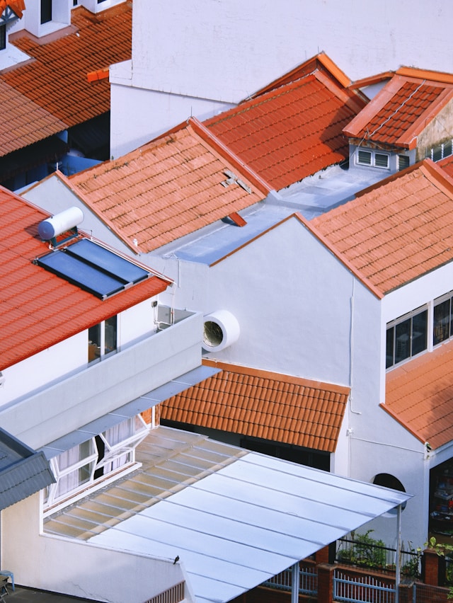 tiled roofs on white houses
