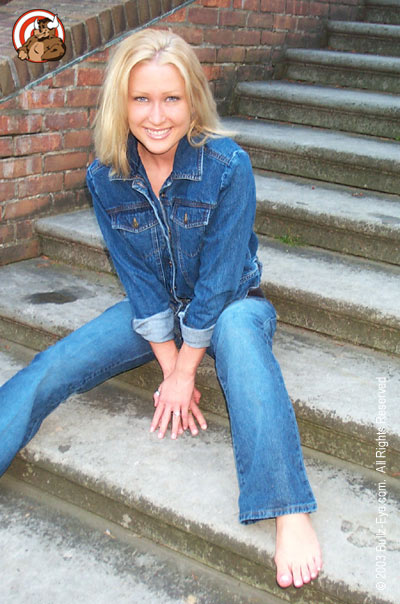Heather in jeans and jean jacket barefoot