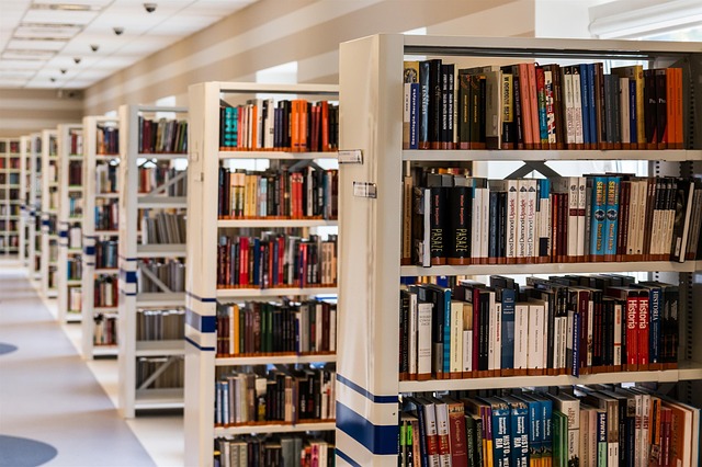 book shelves in library loaded with books