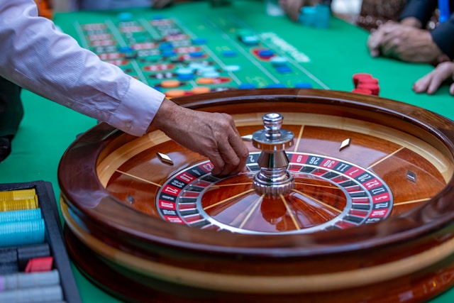 roulette table with dealer hand