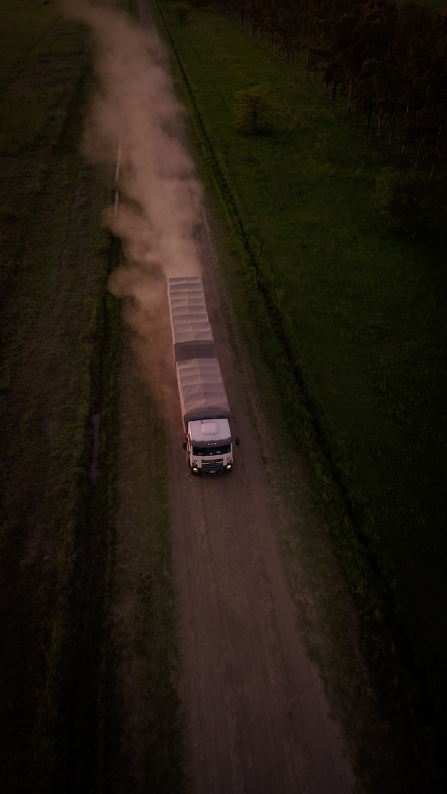 ariel photo of large truck driving on road