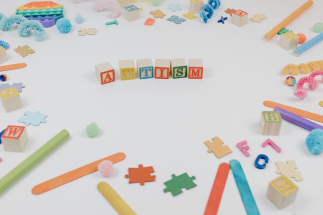 autism spelled in wooden blocks