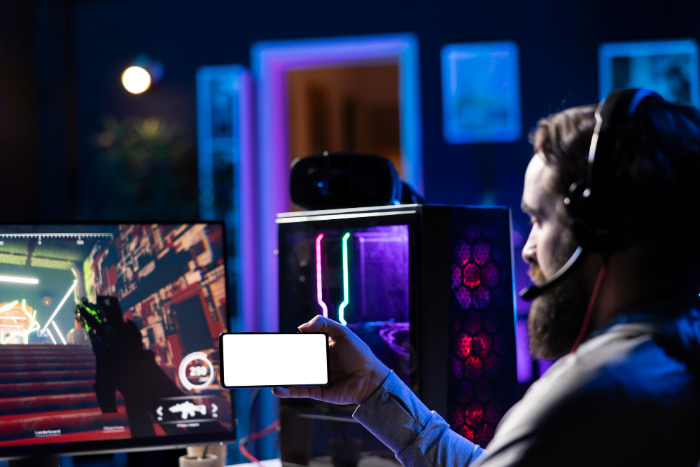 gamer holding phone