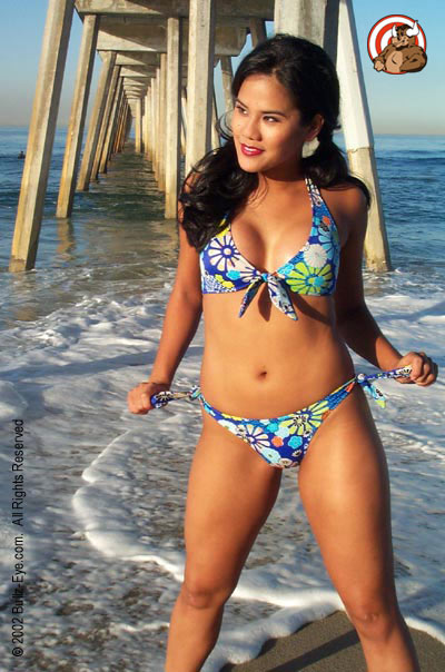 Jazmine in flowery bikini at Hermosa Beach under the dock