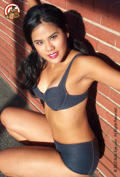 Jazmine in jean bikini and pig tails crouching