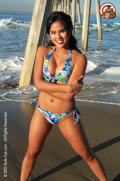 Jazmine in flowery bikini at Hermosa Beach under the dock