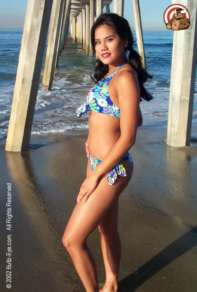 Jazmine in flowery bikini at Hermosa Beach under the dock