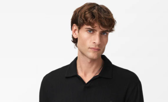 man in black polo shirt
