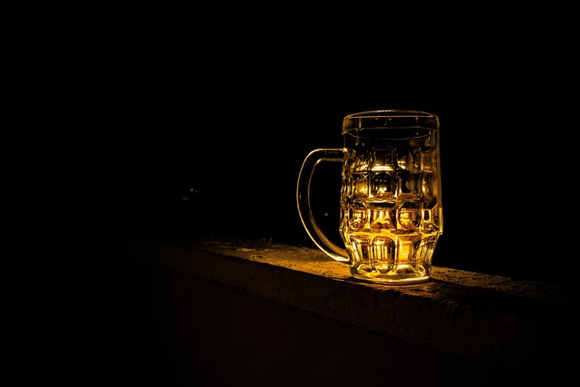pint of beer with light shining on it