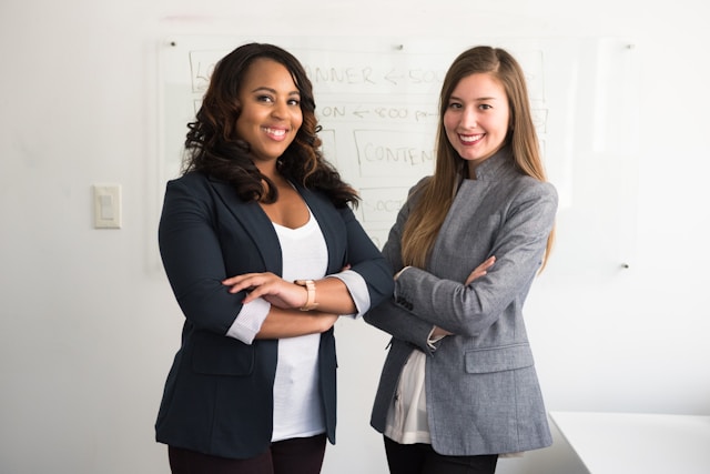 two women in suits