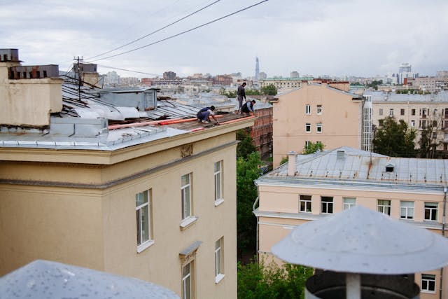 group of workers on rooftop