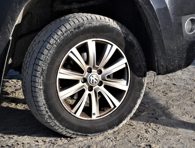 closeup of car tire and rims