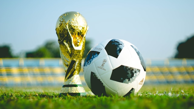 world cup trophy and soccer ball