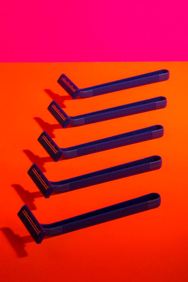 blue razors on red background