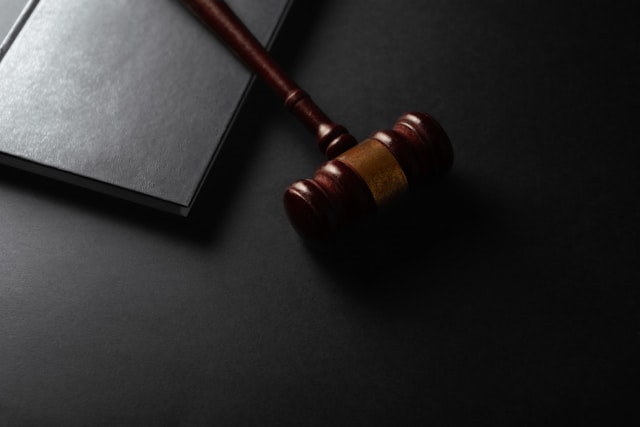 wooden gavel and book