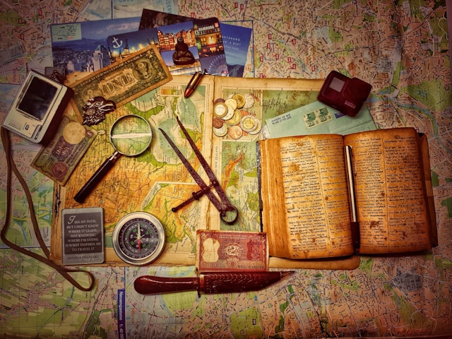 brown wooden scissors and book