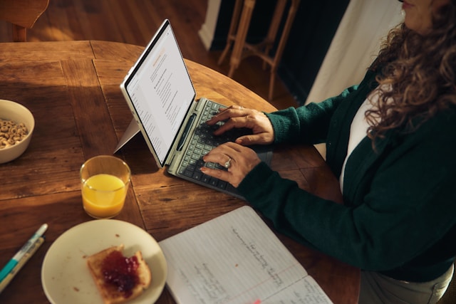 woman at desk on laptop