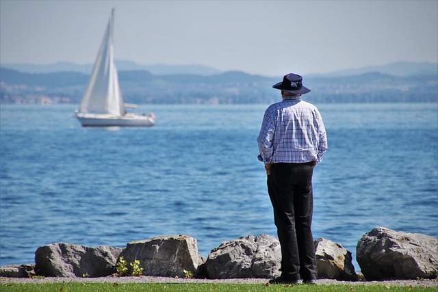 man looking at water