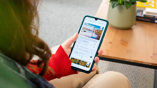 woman booking travel on her smartphone