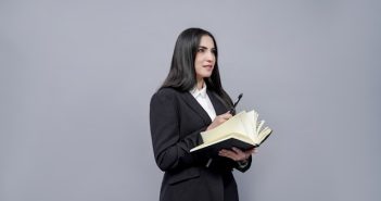 female attorney with dark hair in business suit