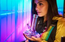 How to Use a Bong Safely and Responsibly woman holding bong