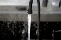 water flowing from kitchen sink