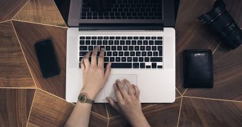 A Guide to Driving Web Traffic With Content Planning laptop