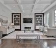 living room with white rug and furniture