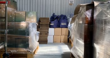 warehouse filled with boxes and bags