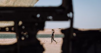 woman walking on a beach