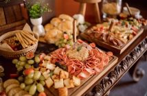 Essential Catering Solutions That Adapt to Modern Business Needs food tray with cold cuts and bread