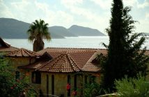 villa near water with old school roof tiles